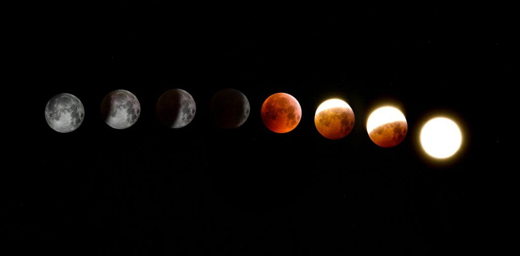 pexels-photo-1983032-1983032 A stunning sequence of moon phases during a lunar eclipse, showcasing the transition from full moon to totality.