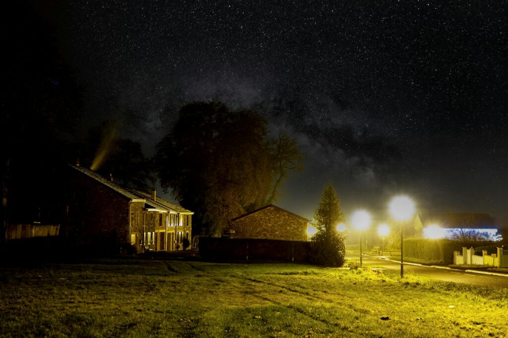 stairs in night sky over neighborhood