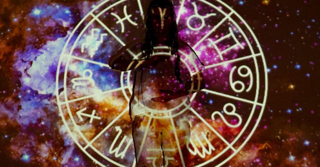 Woman standing with astrological symbols projected, evoking a mystical vibe.